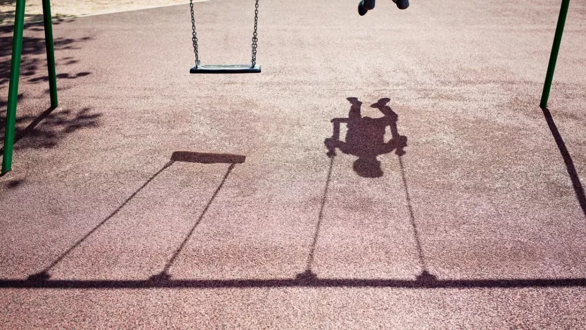 Child on a swingset