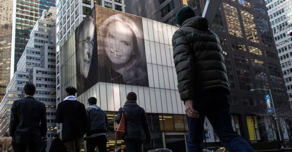 He Hung Pictures Of Himself And His New Wife On A Building To Taunt His Ex