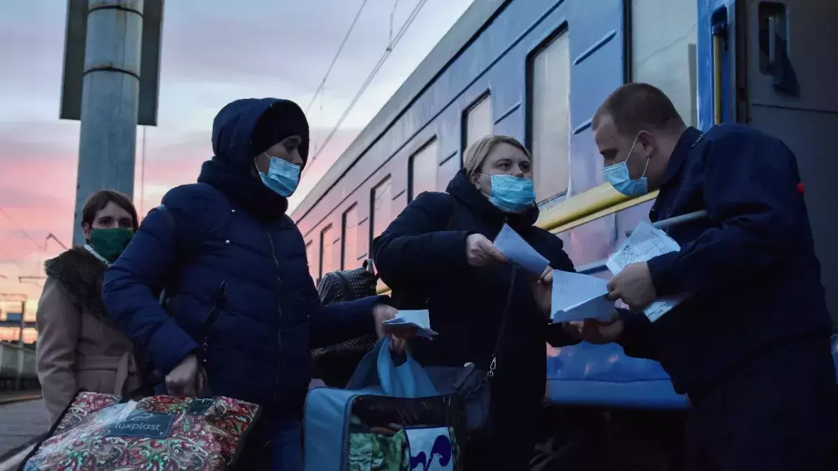 Passengers show their vaccination certificates before boarding.