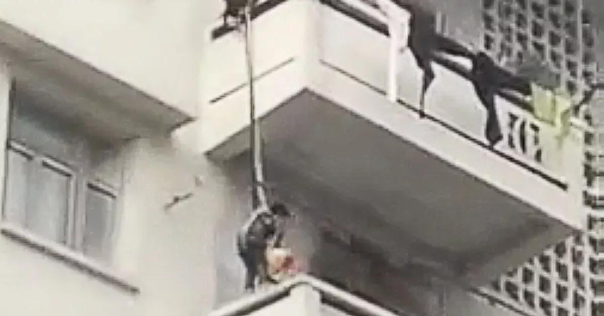 Shocking Footage Shows A Man Risking His Grandchild's Life To Save His Cat