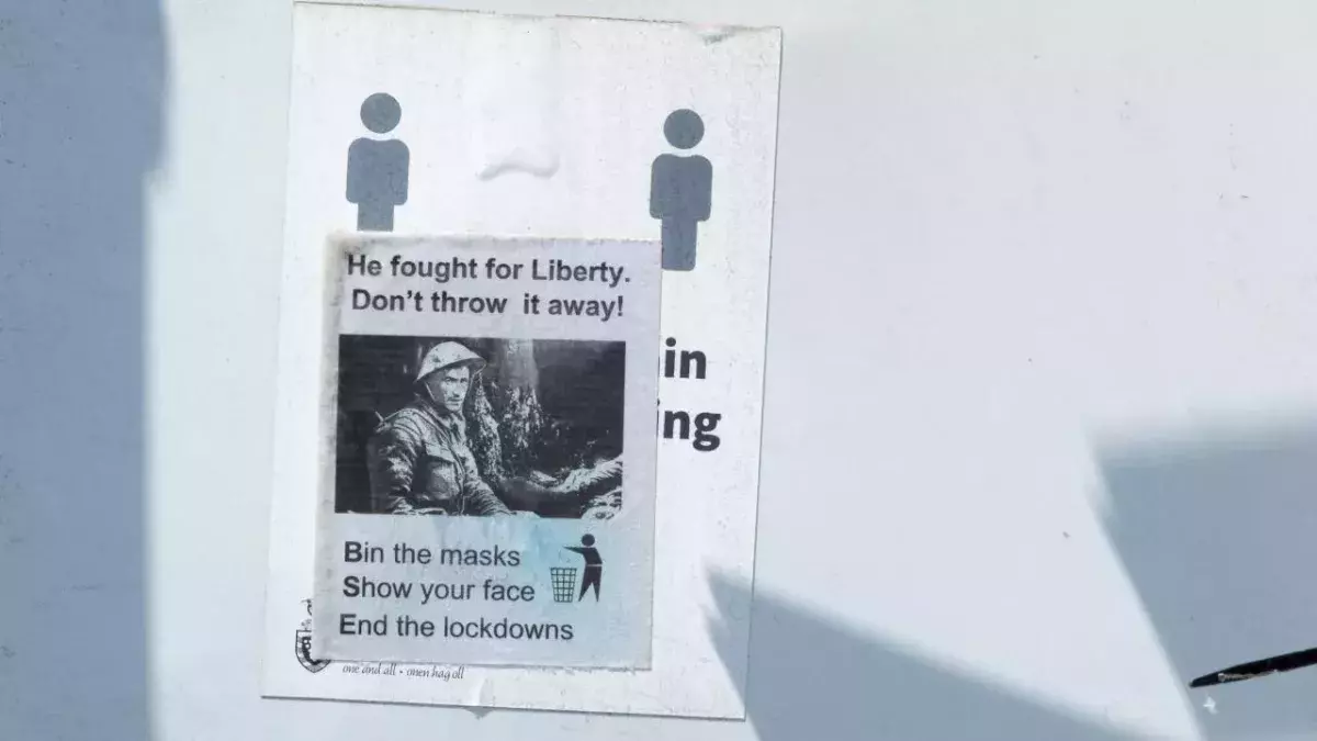 Transport for London staff warned of razors hiding behind COVID conspiracy posters