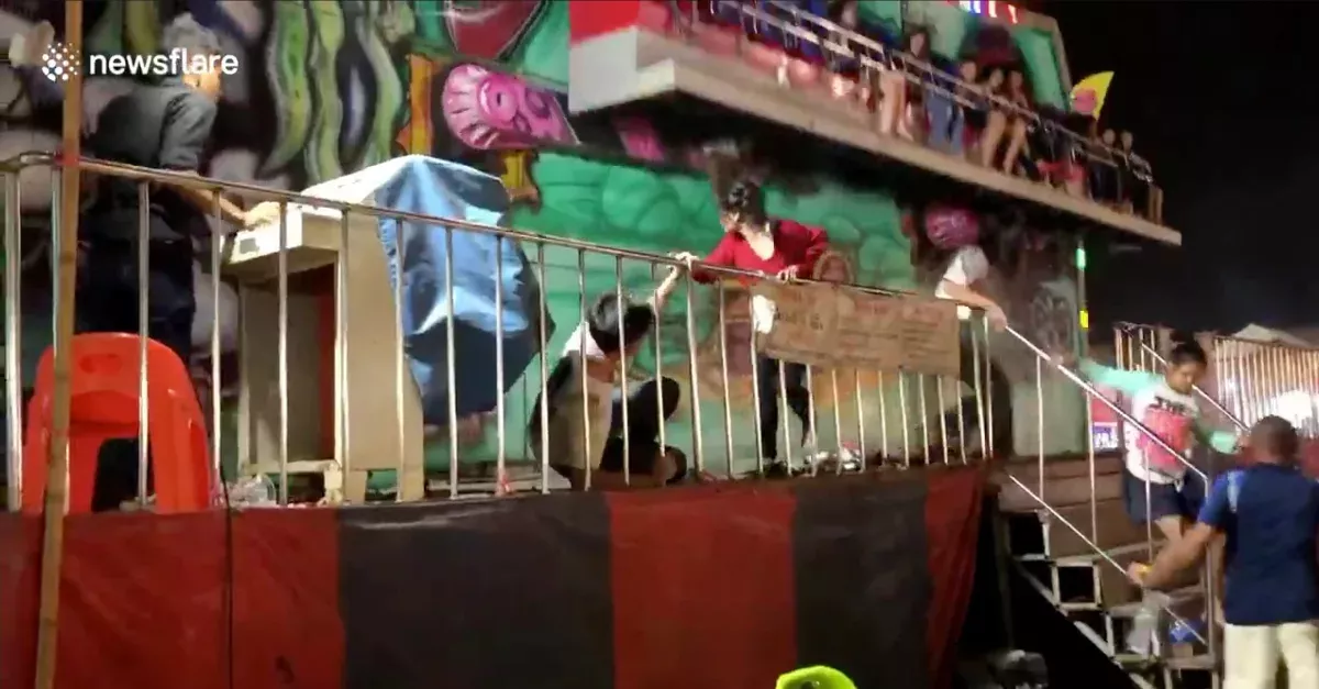 Video Capture Shows Five People Falling Out Of A Carnival Ride