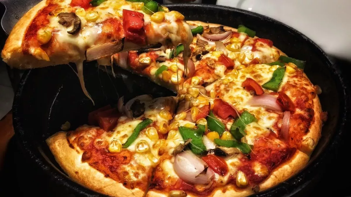 Woman finds bolts and nuts in her Domino's Pizza order 