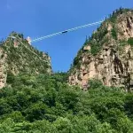 100 metres high glass bridge breaks and leaves tourist stranded at the top