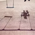 Child on a swingset