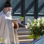 In Detroit, a Priest Is Battling Coronavirus With a Squirt Gun