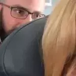 Footage Of American Airlines Passenger Shamed For Repeatedly Pushing Woman's Seat Is Going Viral