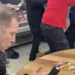 Man Continues To Eat His Chips In The Midst Of A Fight In A Kebab Shop