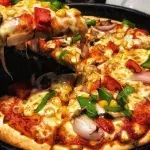 Woman finds bolts and nuts in her Domino's Pizza order 