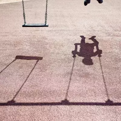 Child on a swingset