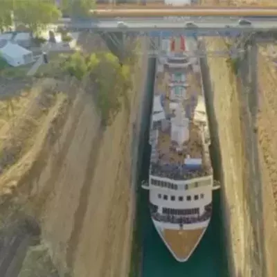 This Huge Cruise Ship Squeezed Through A Tiny Canal And Made It Out Without A Scratch