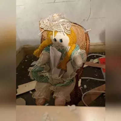 Man finds creepy doll and eerie note inside wall of new home