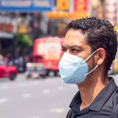 Masked man in big city