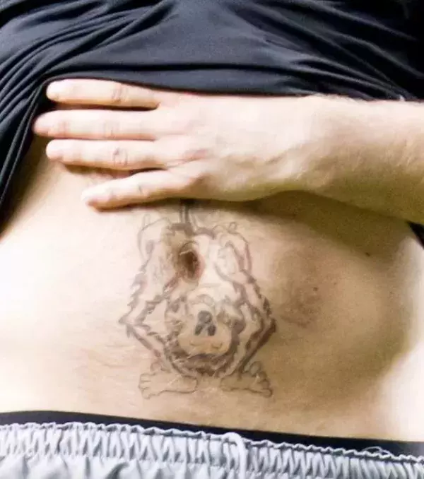 Keeper Artur Boruc is not afraid of anything. His tattoo? A monkey whose butt is the player's belly button…