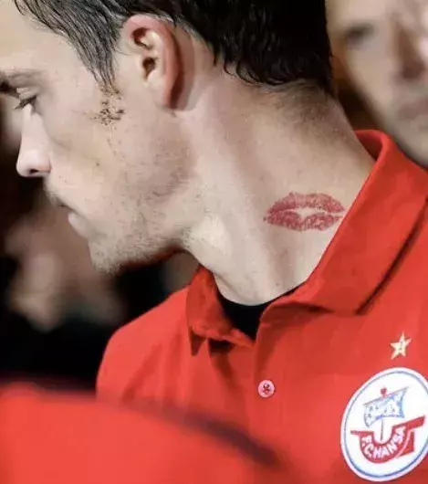 A kiss on the neck for Dennis Erdmann