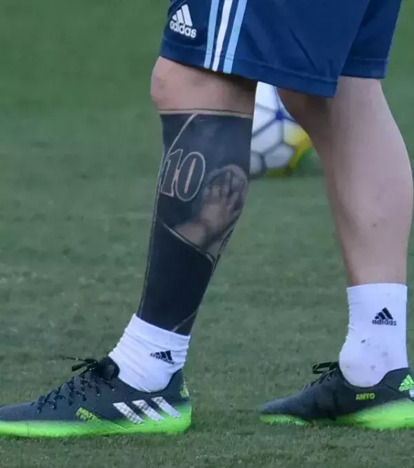 Lionel Messi's blackened half leg
