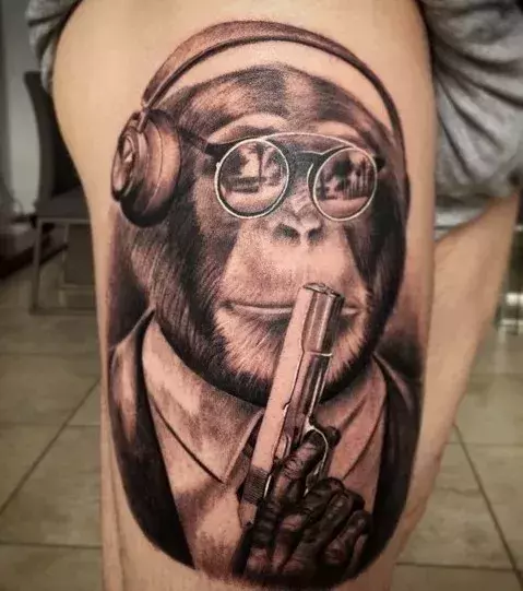 A monkey holding a gun for Liverpool’s Albert Moreno